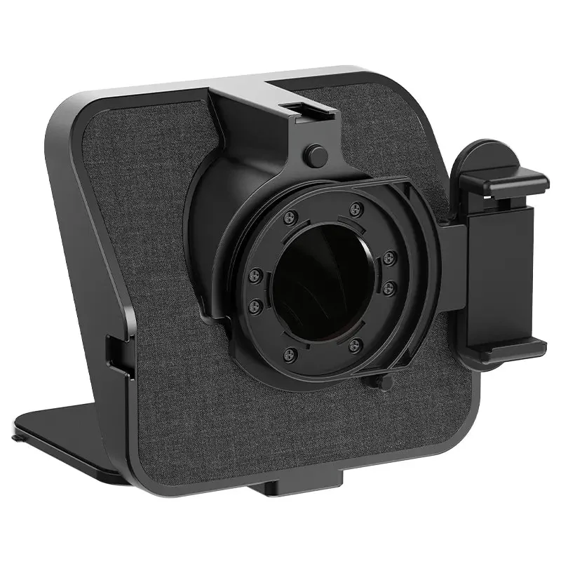 The back, with the lens opening and the quick-release phone holder